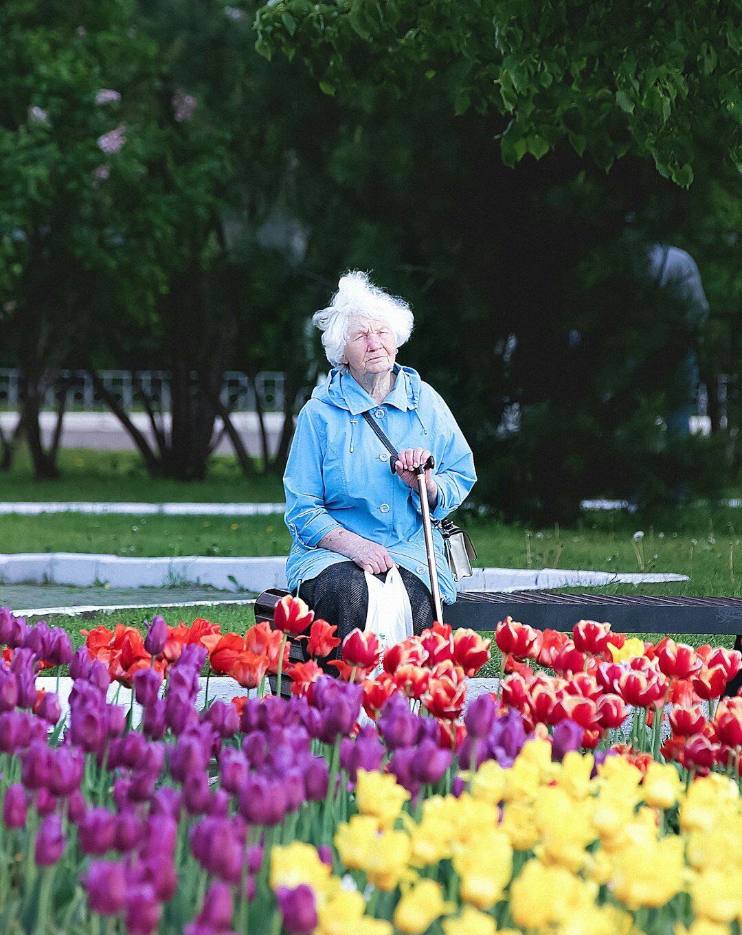 elderly woman in garden