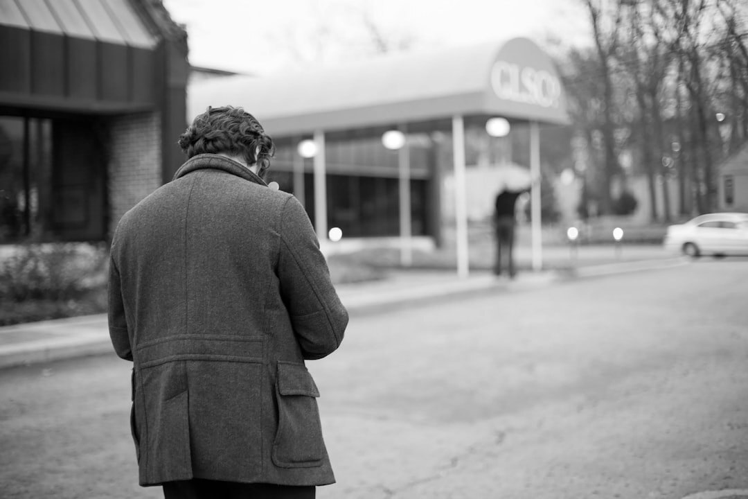 documentary photographer capturing street scene